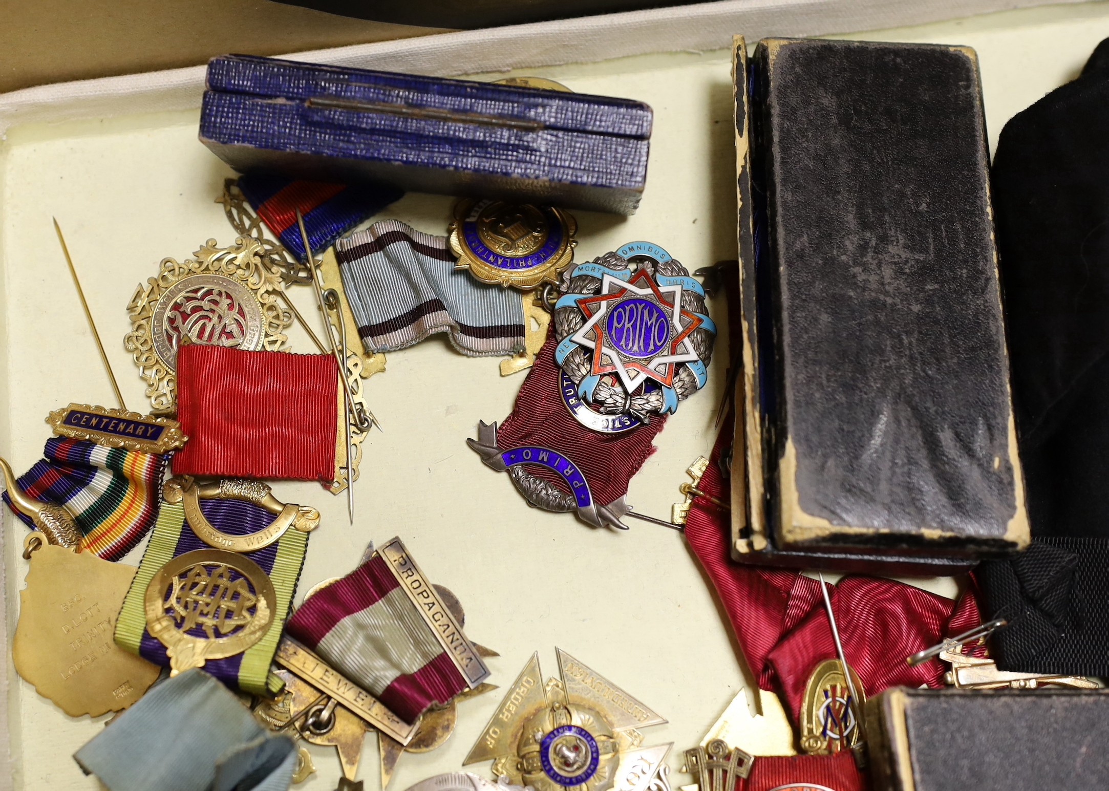 A collection of Kent, local Masonic lodge medals/accessories;, twenty two silver jewels, eleven other medals/jewels and five aprons and associated sashes